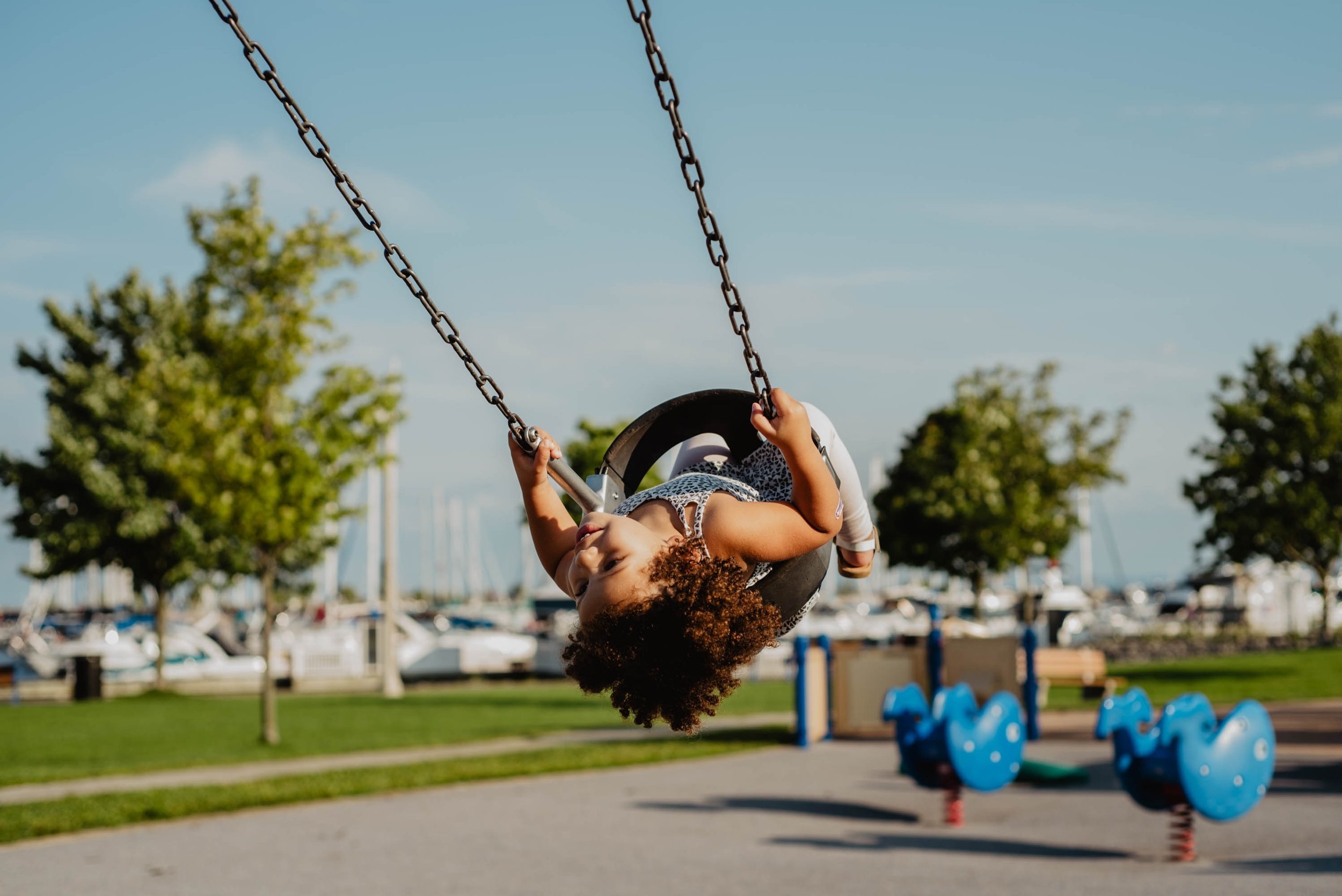small child on a swing